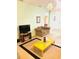 Inviting living room featuring a TV and comfortable seating arrangement creating a relaxing space at 4102 Lake Marion Golf Resort # 4102, Kissimmee, FL 34759
