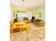 Comfortable living room featuring a dining area, neutral decor, and ample natural light at 4102 Lake Marion Golf Resort # 4102, Kissimmee, FL 34759