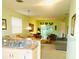 Open-concept living area with combined kitchen, dining, and living spaces, offering a bright and airy feel at 4102 Lake Marion Golf Resort # 4102, Kissimmee, FL 34759