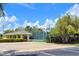Outdoor basketball court with a nearby covered seating area in a beautiful community setting at 4188 Muirfield Loop, Lake Wales, FL 33859