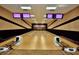 Community bowling alley featuring multiple lanes with modern scoring systems at 4188 Muirfield Loop, Lake Wales, FL 33859