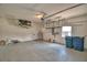 Spacious garage providing ample storage and parking space at 4188 Muirfield Loop, Lake Wales, FL 33859