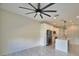 Open floorplan featuring a kitchen island, stainless steel appliances, and tile flooring at 4188 Muirfield Loop, Lake Wales, FL 33859
