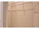 Walk-in closet featuring wire shelving units for storage at 4188 Muirfield Loop, Lake Wales, FL 33859