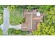 Overhead aerial view of the home displaying the roofline, spacious yard, and mature landscaping at 4219 Forest Hills Dr, Lakeland, FL 33813