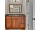 Bathroom with vanity, mirror, and shower at 4219 Forest Hills Dr, Lakeland, FL 33813