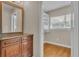 Dressing room with granite topped vanity, and closet with built-ins at 4219 Forest Hills Dr, Lakeland, FL 33813