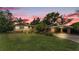 Charming single-story home featuring a well-maintained lawn, carport, and inviting curb appeal at 4219 Forest Hills Dr, Lakeland, FL 33813