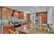 Beautiful kitchen with granite countertops, stainless steel appliances, and mosaic tile backsplash at 4219 Forest Hills Dr, Lakeland, FL 33813