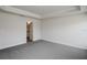 Spacious bedroom featuring a tray ceiling and an ensuite bathroom at 5409 Waterside Dr, Auburndale, FL 33823