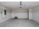 Spacious two-car garage with ample storage space and door to the house at 5409 Waterside Dr, Auburndale, FL 33823