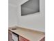 A wet bar setup with a sink, mini refrigerator, and a countertop space at 59 Jimmy Lee Rd, Winter Haven, FL 33880