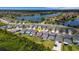 Aerial view showcases homes in a lakeside community, highlighting location at 6261 Great Bear Dr, Lakeland, FL 33805