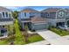 Beautiful aerial view of a two-story home, landscaping, and attached garage at 6261 Great Bear Dr, Lakeland, FL 33805