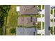 Birds eye aerial view of rooftops and driveways of several houses at 6261 Great Bear Dr, Lakeland, FL 33805