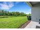 View of the green backyard at 6261 Great Bear Dr, Lakeland, FL 33805