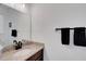 Bathroom featuring a granite vanity and wall mounted towel rack at 6261 Great Bear Dr, Lakeland, FL 33805