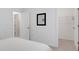 Bright bedroom featuring closet and ensuite bathroom at 6261 Great Bear Dr, Lakeland, FL 33805