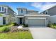 Charming two-story home with well-maintained landscaping and a two-car garage at 6261 Great Bear Dr, Lakeland, FL 33805