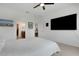Comfortable main bedroom with a ceiling fan and multiple entry points at 6261 Great Bear Dr, Lakeland, FL 33805