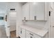 Walk-in pantry offers shelving and countertop space for storage and organization in the kitchen area at 6261 Great Bear Dr, Lakeland, FL 33805