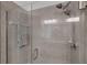 Contemporary shower featuring dual shower heads and glass enclosure at 6261 Great Bear Dr, Lakeland, FL 33805