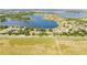 Gorgeous aerial view of a neighborhood near a lake, showcasing the beautiful surrounding landscape at 633 Hart Lake Dr, Winter Haven, FL 33884