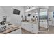 Spacious bathroom with a double vanity, marble countertops, and a walk-in shower at 633 Hart Lake Dr, Winter Haven, FL 33884