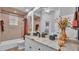 Charming bathroom featuring a shower, vanity, and lots of natural light at 633 Hart Lake Dr, Winter Haven, FL 33884