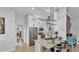 Bright kitchen with stainless steel appliances, granite countertops, and a stylish island with seating at 633 Hart Lake Dr, Winter Haven, FL 33884