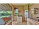 Exterior shot of the lanai features an outdoor kitchen area, with a grill and sink, perfect for entertaining at 633 Hart Lake Dr, Winter Haven, FL 33884