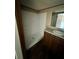 Bathroom with shower, wood-look floors, and vanity with stone countertop at 711 Whispering Pines Dr, Auburndale, FL 33823