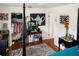 Cozy bedroom with a large bed, walk-in closet, and quaint vanity area at 819 Glendale St, Lakeland, FL 33803