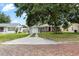 Charming single story home with a detached single car garage and mature landscaping at 819 Glendale St, Lakeland, FL 33803