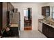 Open kitchen with stainless appliances and dining area view at 819 Glendale St, Lakeland, FL 33803