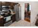 Well-appointed kitchen with stainless steel appliances and patterned flooring at 819 Glendale St, Lakeland, FL 33803