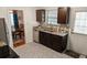 Well-equipped kitchen with stainless appliances and a view to the dining room at 819 Glendale St, Lakeland, FL 33803