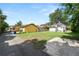 Aerial view of backyard with lush grass, showcasing property's outdoor space at 918 South Blvd, Lakeland, FL 33803