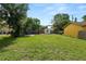 Spacious backyard with green lawn, perfect for Gathering gatherings at 918 South Blvd, Lakeland, FL 33803