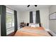 Bright bedroom with a large window, comfortable bed, and stylish decor elements at 918 South Blvd, Lakeland, FL 33803