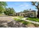 Street view showcasing the home's covered front porch and proximity to neighboring properties at 918 South Blvd, Lakeland, FL 33803
