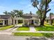 Charming single-Gathering home with a covered front porch, walkway and well maintained lawn at 918 South Blvd, Lakeland, FL 33803