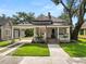 Charming single-Gathering home with a covered front porch, walkway and well maintained lawn at 918 South Blvd, Lakeland, FL 33803