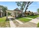 Charming single-Gathering home with a covered front porch, walkway and well maintained lawn at 918 South Blvd, Lakeland, FL 33803