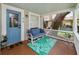 Inviting front porch with comfortable seating and charming details; perfect for relaxing outdoors at 918 South Blvd, Lakeland, FL 33803
