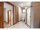 Bathroom featuring a tiled floor, toilet, and glass enclosed shower at 929 Hammock Shade Dr, Lakeland, FL 33809