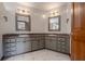 Bathroom vanity with dual sinks, cabinets, and drawers at 929 Hammock Shade Dr, Lakeland, FL 33809