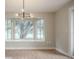 Dining area with a bay window and light fixture at 929 Hammock Shade Dr, Lakeland, FL 33809