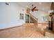 Bright and spacious living room with high ceilings, and hardwood floors at 929 Hammock Shade Dr, Lakeland, FL 33809
