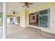 Covered patio with ceiling fans and view of pool at 929 Hammock Shade Dr, Lakeland, FL 33809
